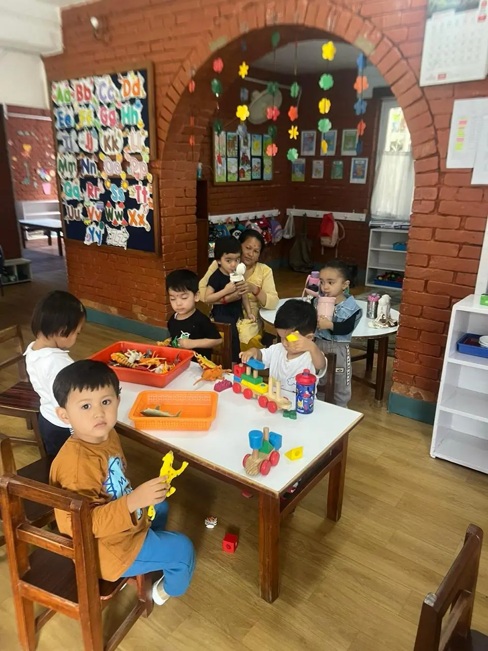 Children engaging in fun activities at Mother Care.